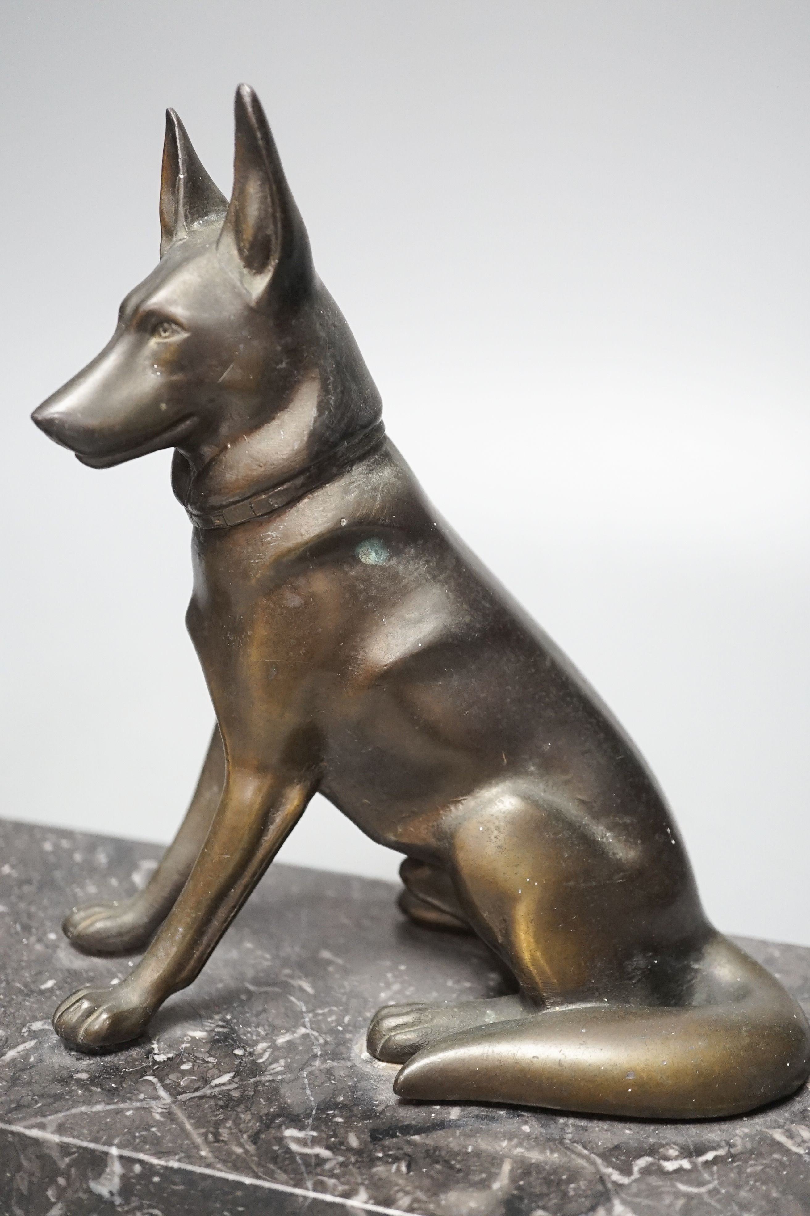 An Art Deco patinated spelter German Shepherd group, 40cm